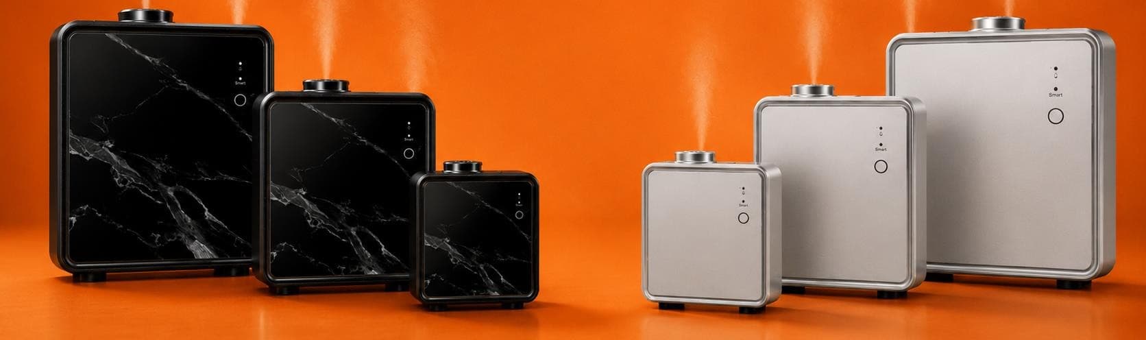 La gamme Atmos en marbre noir et acier, vapeur s'échappant des buses
